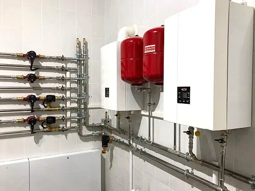 Отопление коттеджа в Ленинградской области каскадом 2 котлов WOLF