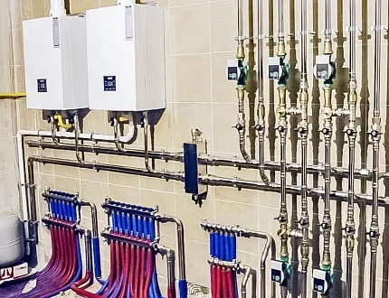 Нержавеющая система отопления смонтирована в частном доме 500 мм² на базе каскада 2-х котлов WOLF (г. Санкт-Петербург)