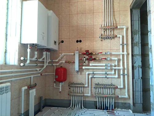 K.TGR на объекте Отопление Омск на базе двух настенных котлов Protherm в коттедже п. Ракитинка