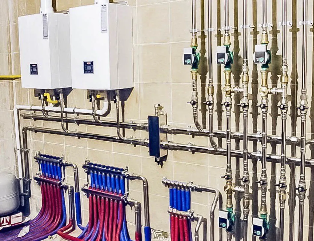 Нержавеющая система отопления смонтирована в частном доме 500 мм² на базе каскада 2-х котлов WOLF (г. Санкт-Петербург)